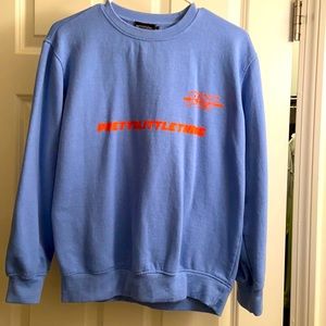 Blue and orange sweatshirt